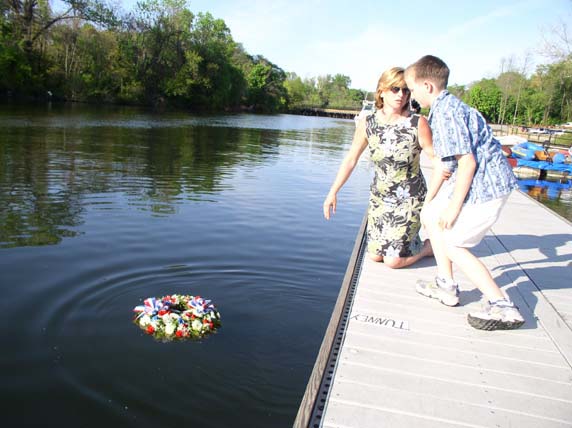 P & Z Errickson laying the wreath